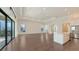 Spacious living room with hardwood floors and large windows at 428 Bocelli Dr, North Venice, FL 34275