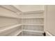 Walk-in pantry features wire shelving for organized storage at 428 Bocelli Dr, North Venice, FL 34275