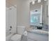 Bathroom featuring a granite vanity, mirror, and shower with tub at 4717 Sabal Key Dr, Bradenton, FL 34203