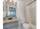 Bathroom featuring a granite vanity, mirror, and shower with tub at 4717 Sabal Key Dr, Bradenton, FL 34203