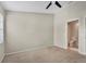 Bedroom with carpet, ceiling fan, and access to the en-suite bath at 4717 Sabal Key Dr, Bradenton, FL 34203