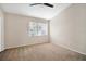 Neutral bedroom featuring carpet, a ceiling fan, and a bright window at 4717 Sabal Key Dr, Bradenton, FL 34203