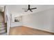 Open-concept living space with hardwood flooring, a staircase, and recessed lighting at 4717 Sabal Key Dr, Bradenton, FL 34203