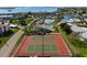 Aerial view of community showing tennis courts, pool, and waterway access at 4721 Mount Vernon Dr, Bradenton, FL 34210