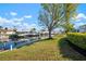 Backyard view with waterfront access and boats at 4721 Mount Vernon Dr, Bradenton, FL 34210