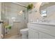 Bathroom featuring a glass shower, bright white vanity, and attractive fixtures at 4721 Mount Vernon Dr, Bradenton, FL 34210