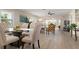 Dining room featuring stylish table and chairs, with natural light and a modern design at 4721 Mount Vernon Dr, Bradenton, FL 34210