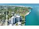 Aerial view of waterfront condo showcasing its prime location and serene surroundings at 4822 Ocean Blvd # 2D, Sarasota, FL 34242