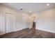 Large room features modern flooring, recessed lighting, and multiple closets at 501 Reclinata Dr, Longboat Key, FL 34228