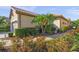 Exterior of a home with manicured landscaping and a brick walkway at 5556 Cantucci St, Nokomis, FL 34275