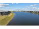 Stunning aerial view of the community lake at 8071 Slipway Dr, Sarasota, FL 34240