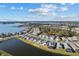 Scenic aerial shot of a lakeside neighborhood showcasing well-maintained homes and tranquil water views at 8071 Slipway Dr, Sarasota, FL 34240