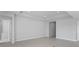 Open living area with recessed lighting, neutral walls, and adjacent doorways to other rooms at 8071 Slipway Dr, Sarasota, FL 34240
