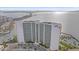 Expansive condominium complex with a bridge view at 888 Blvd Of The Arts # 1008, Sarasota, FL 34236