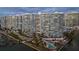 Luxurious waterfront condominium with a swimming pool and meticulously landscaped grounds at 888 Blvd Of The Arts # 1008, Sarasota, FL 34236