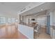 Bright open kitchen with a breakfast bar and stainless steel appliances at 888 Blvd Of The Arts # 1008, Sarasota, FL 34236