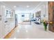 Bright kitchen with white cabinetry, subway tile backsplash, stainless steel appliances, and breakfast nook at 916 Michigan Ave, Palm Harbor, FL 34683