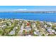 Scenic aerial shot of the house near the waterfront, highlighting its proximity to the ocean and surrounding community at 115 24Th W St, Bradenton, FL 34205