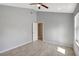 A modern and minimalist bedroom with ample space, natural light and neutral color palette at 115 24Th W St, Bradenton, FL 34205