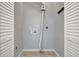 A closet with shelving and a laundry hookup is ready to be utilized at 115 24Th W St, Bradenton, FL 34205