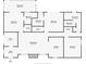 Detailed floor plan showcasing bedrooms, bathrooms, kitchen, living room, and back patio dimensions at 115 24Th W St, Bradenton, FL 34205