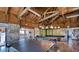 Spacious game room with ping pong, and pool tables, and rustic wooden ceiling at 13575 Martha Ave, Port Charlotte, FL 33981