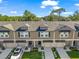 Charming townhome with attached garage, neatly manicured lawn, and welcoming curb appeal at 17136 Blowfish Dr, Nokomis, FL 34275