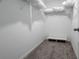 Spacious walk-in closet includes carpet, wire shelving, and room for organization at 17136 Blowfish Dr, Nokomis, FL 34275