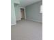 Cozy bedroom with closet, carpet floors, and natural light from a window at 18576 Alphonse Cir, Port Charlotte, FL 33948