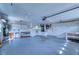 Spacious garage with ample storage and workspace, complete with a peg board at 18576 Alphonse Cir, Port Charlotte, FL 33948