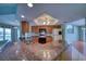 Spacious kitchen with granite counters, wood cabinets, and modern appliances overlooks the backyard at 18576 Alphonse Cir, Port Charlotte, FL 33948