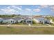 Neighborhood aerial view of the well-manicured lawns and sidewalks connecting charming single-Gathering homes at 1944 Vang Ln, Sarasota, FL 34240