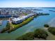 Beautiful aerial view of waterfront condos and community overlooking the scenic bay at 2424 Placida Rd # C104, Englewood, FL 34224