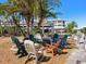 Outdoor fire pit surrounded by seating area, ideal for community gatherings and social events at 2424 Placida Rd # C104, Englewood, FL 34224