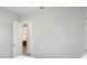 This bedroom features an open doorway and neutral walls creating a blank canvas for personalization and comfortable living at 3517 Big Sky Way, Bradenton, FL 34211