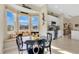 Kitchen with bay windows and an eat-in dining table, offering scenic waterfront views at 3831 Creekside Park Dr, Parrish, FL 34219