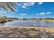 Scenic view of a pond within the community, highlighting the tranquil setting and landscaping at 3831 Creekside Park Dr, Parrish, FL 34219