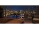 Balcony with dining and seating offering panoramic city views at 550 Golden Gate Point # 701, Sarasota, FL 34236