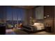 Serene main bedroom with large windows and a decorative accent wall at 550 Golden Gate Point # 701, Sarasota, FL 34236