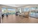 Bright living area with sliding glass doors, neutral decor and views of the pool at 585 Cutter Ln, Longboat Key, FL 34228