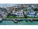 Stunning waterfront home with a private boat dock and inviting screened-in pool area for relaxing outdoors at 585 Cutter Ln, Longboat Key, FL 34228