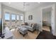 Relaxing living room with water view with comfortable seating and balcony access at 624 N Point Dr, Holmes Beach, FL 34217