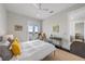 Bright bedroom with a private balcony offering a picturesque view at 624 N Point Dr, Holmes Beach, FL 34217