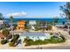 Stunning beachfront homes with colorful exteriors and beautiful landscaping with ocean views at 912 N Shore Dr, Anna Maria, FL 34216