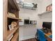 Efficient home office features organized shelving, a desk with computer, and functional workspace at 16741 Ellsworth Ave, Bradenton, FL 34202