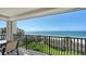 Relax and enjoy the ocean views from the spacious balcony with seating at 2675 Gulf Of Mexico Dr # 301, Longboat Key, FL 34228
