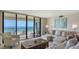 Bright living room featuring stylish furnishings and ocean views at 2675 Gulf Of Mexico Dr # 301, Longboat Key, FL 34228