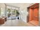 Lobby with tile flooring, large windows, an elevator, and a modern design at 2675 Gulf Of Mexico Dr # 301, Longboat Key, FL 34228