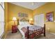 Cozy bedroom with a queen-size bed, stylish decor, and a closet for storage at 28 Tall Trees Ct, Sarasota, FL 34232