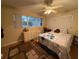 Comfortable bedroom with neutral walls and a soft accent rug at 3054 Mancini Ter, Punta Gorda, FL 33983